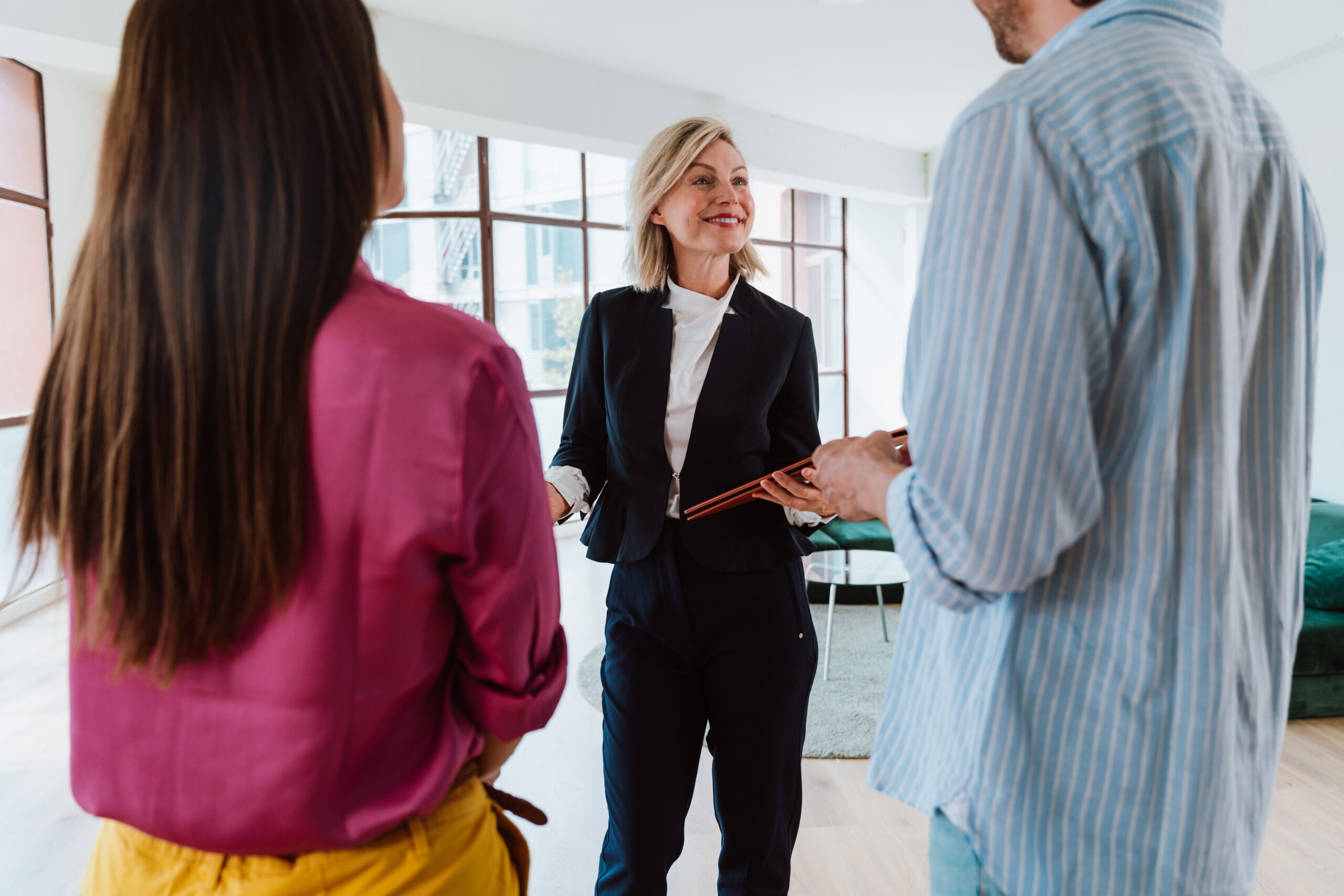 Real estate agent showing apartment during a tour.